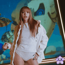 a woman is dancing in front of a screen that says " look at lalisa "