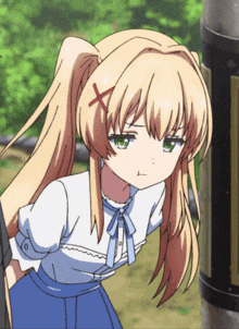 a blonde anime girl with a red x on her hair