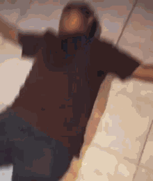 a blurry picture of a person laying on the floor .