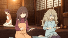 a girl in a sweater that says sheep is cutting fish