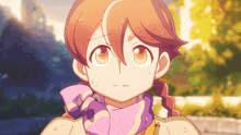 a close up of a girl wearing a scarf and braids