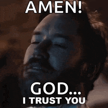 a man with a beard is saying amen ! god ... i trust you
