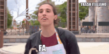 a woman wearing an apron is making a funny face and the words fa are above her