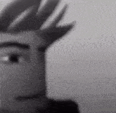 a close up of a cartoon character 's face with a blurred background .