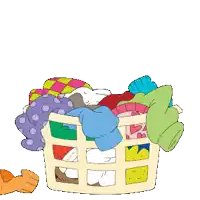 a penguin is sitting in a laundry basket with clothes