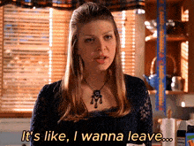 a woman says it 's like i wanna leave in a kitchen