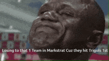 a man in a suit is looking up at something with the words losing to that 1 team in markstrat cuz they hit trigols