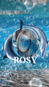 a picture of a woman and two dolphins with the name rosy on the bottom