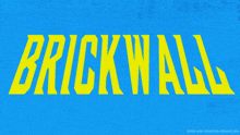 a blue background with yellow letters that say brickwall