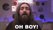 a man with a beard is saying oh boy