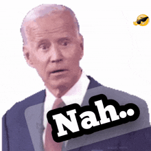 a man in a suit and tie has the word nah on his face