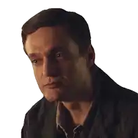 a close up of a man 's face with his eyes closed