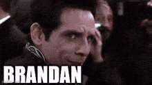 a close up of a man 's face with the word brandan written in the corner .