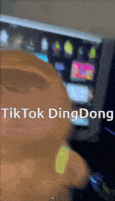 a close up of a person 's face with the words tiktok ding dong written above it