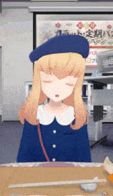 a girl wearing a blue beret is sitting at a table with chopsticks