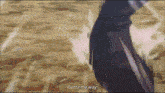 a person is standing on a dirt field and says outta my way