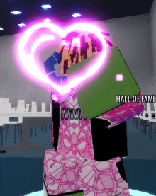 a pink and green cube with the words hall of fame written on it