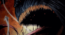 a close up of a monster 's mouth with teeth and blood coming out of it