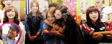 a group of girls are hugging each other with giantbabyjing written on the bottom left