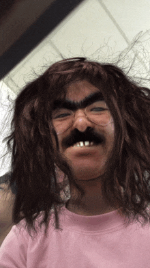 a man wearing glasses and a wig with a mustache
