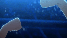 a person 's fist is against another person 's fist against a blue background