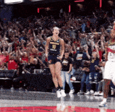 a basketball player wearing a jersey that says indiana on it
