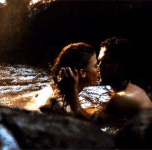 Making Out Couple In Water GIF - Making Out Couple In Water Kissing GIFs