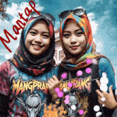 two women wearing hijabs and sunglasses are posing for a picture with a shirt that says mangprang