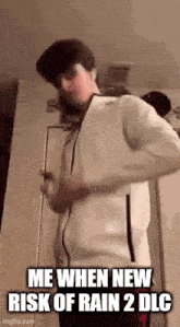 a man in a white jacket is standing in front of a door and says `` me when new risk of rain 2 dlc ''