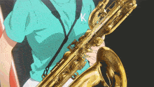 a person holding a saxophone with a k on their shirt