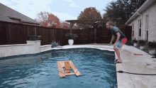 Jumping Into Pool Scott And Camber GIF
