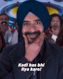 a man in a turban is laughing with the words " kadi has bhi liya karo " written on the bottom