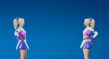 two cheerleaders are standing next to each other with their arms outstretched .