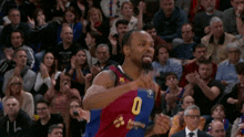a basketball player wearing a jersey with the number 0