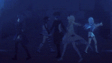 a group of people standing next to each other in a dark room with a blue background .