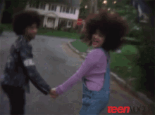 Young Couples GIF - Teen Vogue Young Couple Holding Hands GIFs