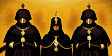 a group of people wearing black robes and helmets