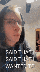 a man wearing glasses and a hoodie says that he said that he wanted to
