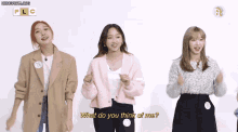 three women are standing next to each other and one of them says what do you think of me