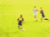 a soccer game is being played in front of a movistar advertisement