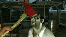 a man with blood on his face is holding a red axe on his head