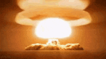 a close up of a nuclear explosion with a mushroom cloud coming out of it .