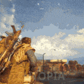 a man holding a gun in front of a building that says etopia on the bottom