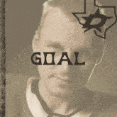 a man 's face is shown with the word goal above it
