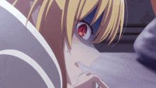 a close up of a cartoon character with red eyes