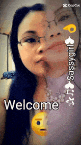 a woman wearing glasses and a necklace says welcome