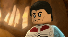 a lego figure with black hair and blue eyes looks angry