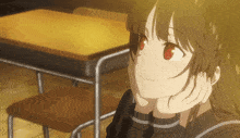 a girl with red eyes is leaning her head on her hand