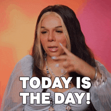 a woman says today is the day while pointing