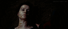 a close up of a woman laying on the ground with the website p3rslv3.tumblr.com visible